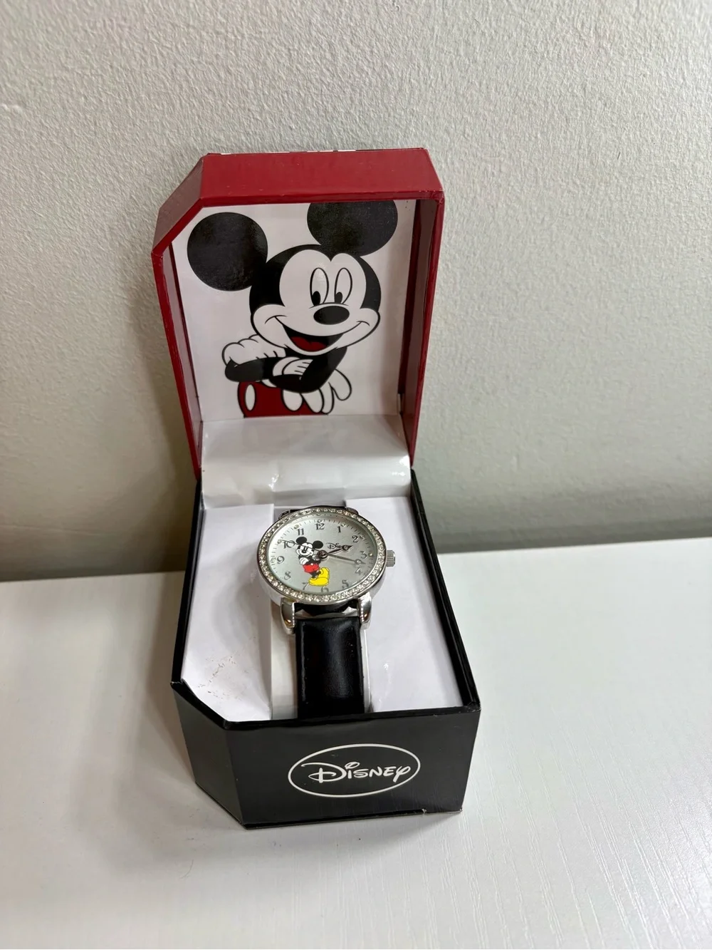 Disney Mickey Mouse Silver-Tone Watch with Black Strap and Red/Yellow Accents